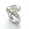 Anillo de plata ley 0,950 con peso 4 gramos con 2 perlas naturales de cultivo