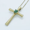 cruz de oro con esmeralda de Colombia