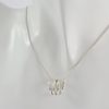 Dije collar de plata ley 0,950 de peso 3 gramos. Diseño aro sin fin.