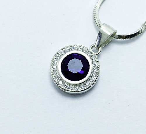 Dije colgante de plata con zafiro creado