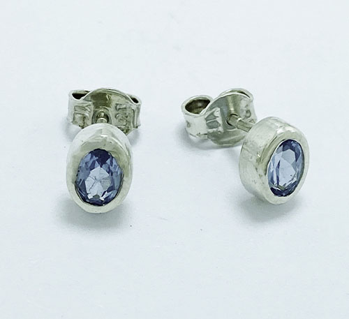 Aretes de plata para niñas con topacios azules